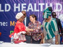 First Lady of the Republic of Liberia, Madam Kartumu Y. Boakai greets the Chairperson on the Health Committee at the House of Senate