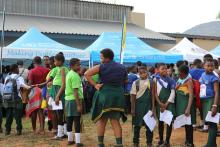 Pupils from one the local primary schools queueing to receive the HPV vaccine during the launch