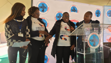 Health experts demonstrating proper hand hygiene practices