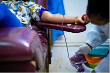 A blood donor donating blood at National Blood Bank.jpg