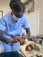 Hands-on training in progress: a healthcare worker participates in a practical reproductive health exercise at Kitengela Hospital. © John Kismir | WHO Kenya