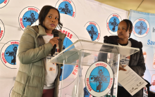 Health experts demonstrating proper hand hygiene practices