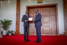 WHO Regional Director for Africa Dr. Mohamed Janabi presents a gift to President William Ruto during the health equipment handover ceremony, State House, Nairobi, 19 November 2024.