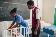 Mercy Cherop demonstrates how to take a baby's measurements at the Kenya Medical Training College Skills Lab, Nairobi. © WHO / Khadija Farah