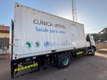 Mobile clinic delivered by WHO in Guinea-Bissau, parked outdoors.