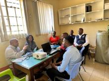 WHO Laboratory specialists discussing the accreditation process with the KCH lab team