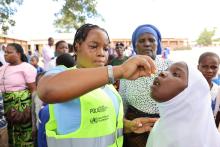 Parents and teachers working together to vaccinate children at Makawa Primary School
