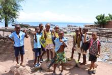 Caroline and Madalitso pose with their vaccinated friends at Chembe Village