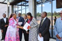 Ministers interacts with Chair of the Kikundi Leadership Council, Madam Meeja Kaura
