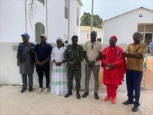 Representatives from WHO, local authorities and partners during a field mission.