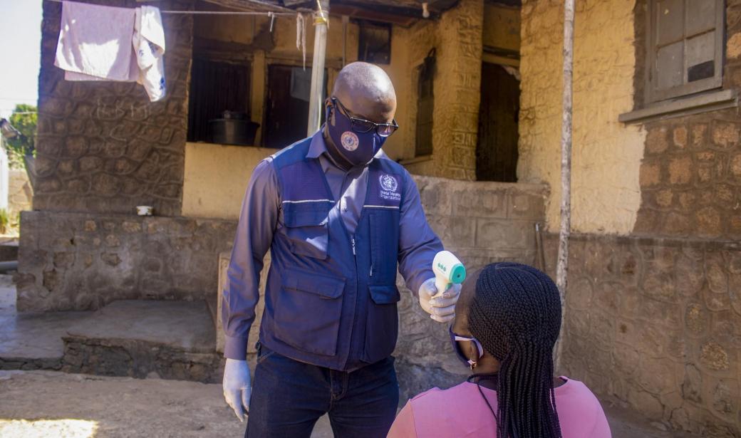 A health officer visits a COVID-19 patient at her home in Agwan Rogo area of Jos.