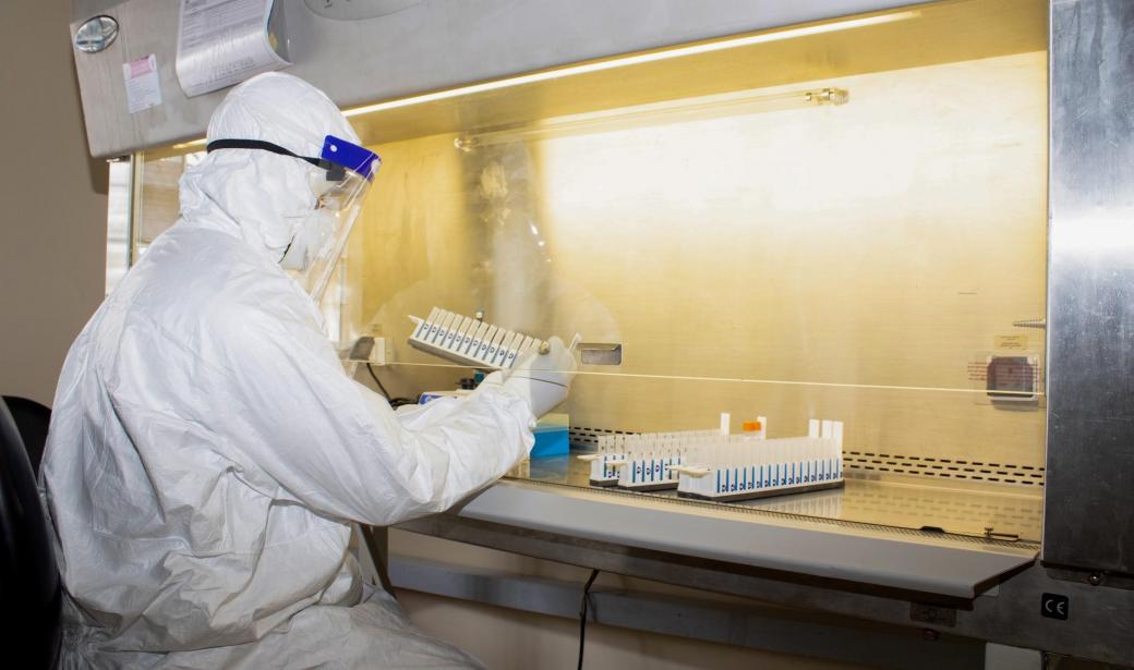 Medical laboratory officer tests COVID-19 samples at a testing centre in the Plateau State Hospital, Jos