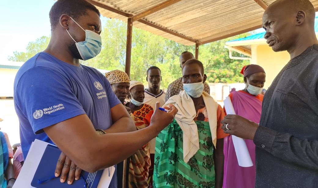 One such beneficiary is 50-year-old Mary Nyakon Chuol (center), who came to Bentiu Hospital in early July to seek medical care for consistent joint pain and headaches. “I have visited the hospital more than three times in the last month and on each occasion some drugs were missing,” she says. “Today I am happy because for the first time I received all the medicines prescribed by the doctor. I am hopeful that they will now help me to recover quickly.”