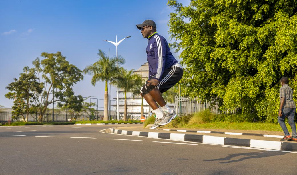 Kigali resident jumping in the air 