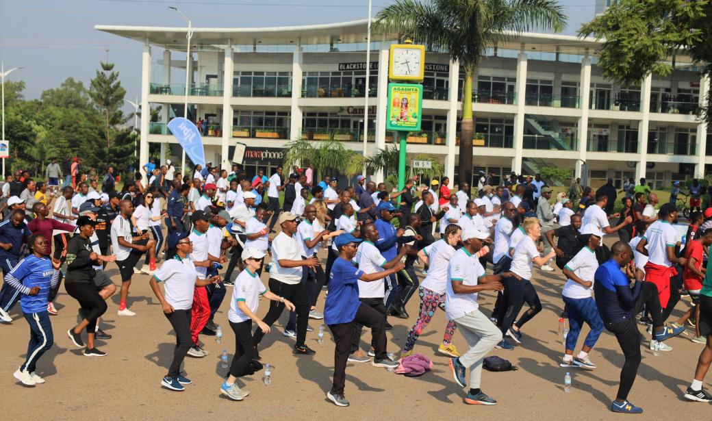 A group of people doing coordinated exercise