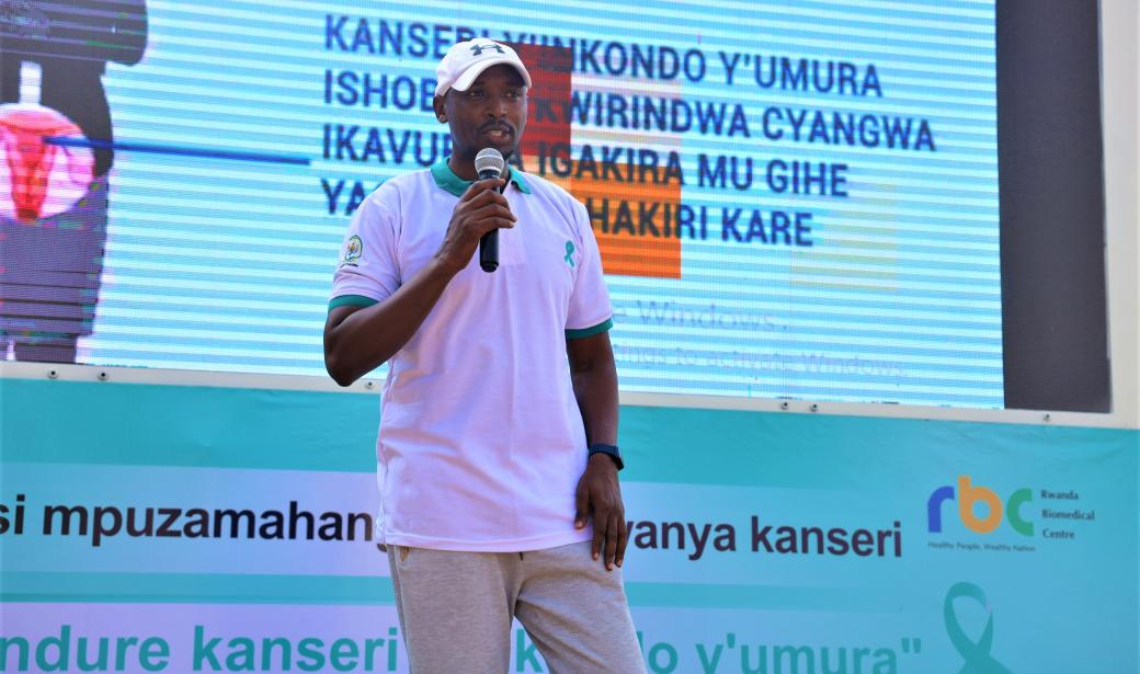 Rwandan Minister of Health, Dr. Sabin Nsanzimana standing on a stage