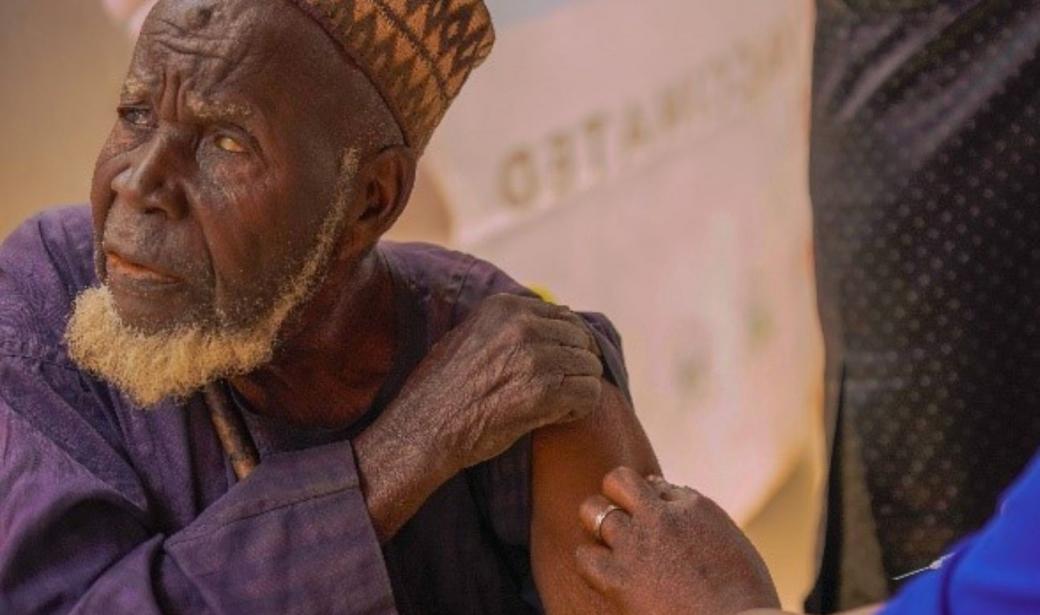 Bature Abdullahi (74) receiving his first COVID-19 shot