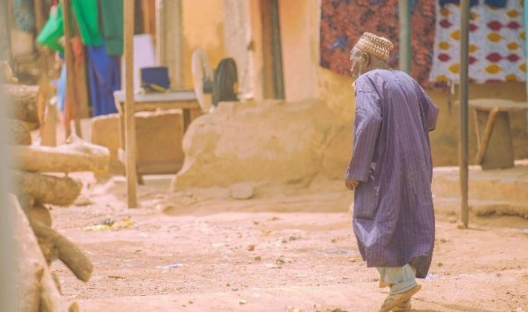 Pa Bature leaves for his home after receiving the COVID-19 vaccine