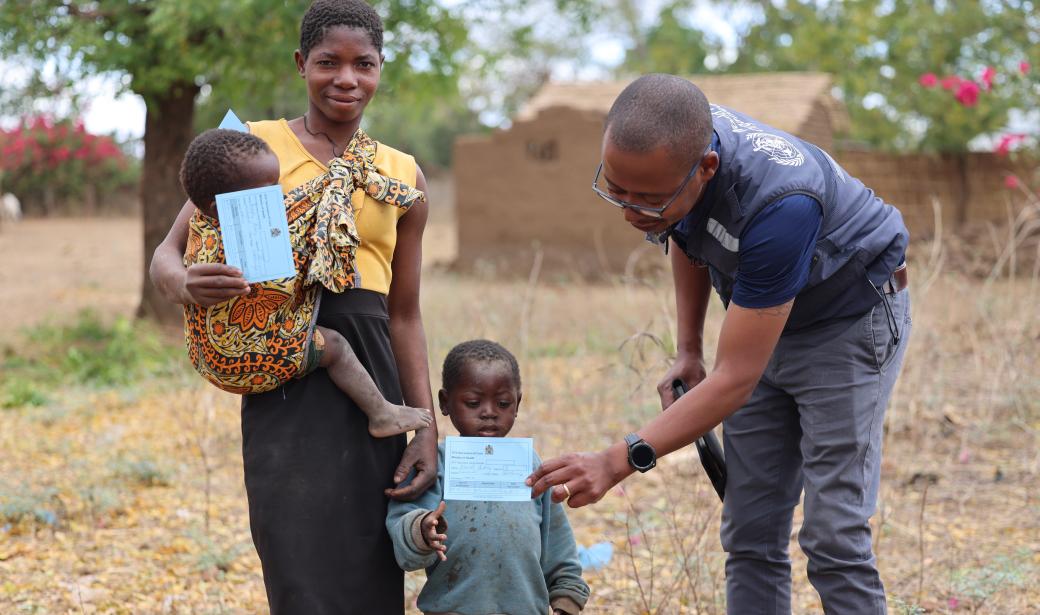 A mother and her two children with vaccination child