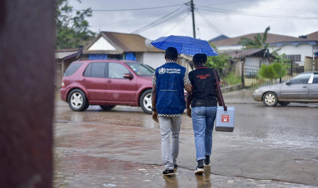 The vaccination team pressing on through the rain to ensure every child is vaccinated.