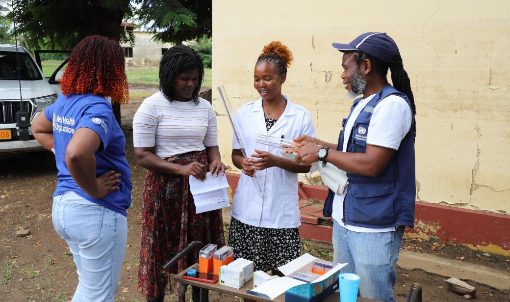 Staff at the Barragem Health Centre during training on disinfection kits and water quality monitoring