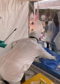 Doctor inside an isolation tent during an emergency